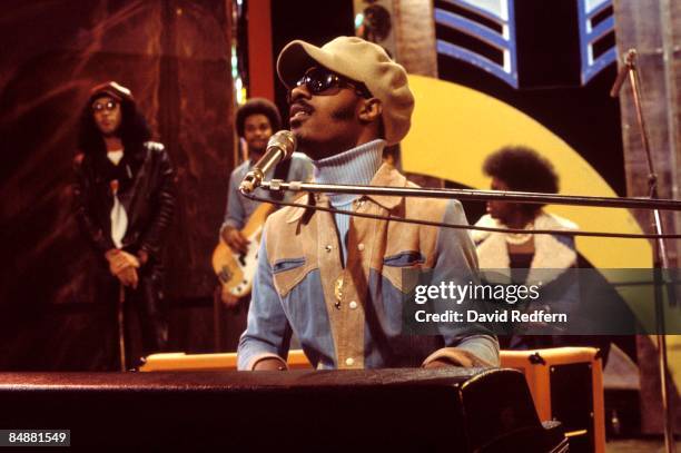 American singer, songwriter, musician and record producer Stevie Wonder performs his song 'Living for The City' on the BBC Television music show Top...