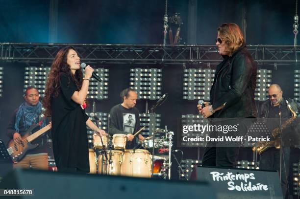Rover and Yael Naim perform at Printemps Solidaire at Place de la Concorde on September 17, 2017 in Paris, France.