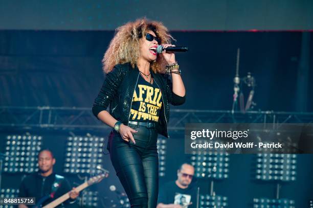 Flavia Coelho performs at Printemps Solidaire at Place de la Concorde on September 17, 2017 in Paris, France.