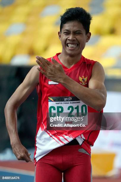 Sapto Yogo Purnomo of Indonesia celebrates after winning in the Men 100 meters T38 Final during the 2017 ASEAN Para Games at the Bukit Jalil National...