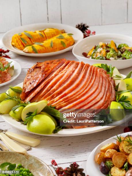 holiday spiral ham dinner - spiral ham stock pictures, royalty-free photos & images