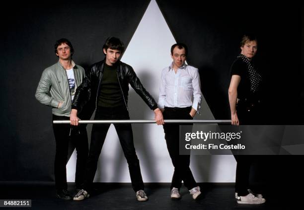 Photo of XTC; Terry Chambers, Colin Moulding, Barry Andrews and Andy Partridge