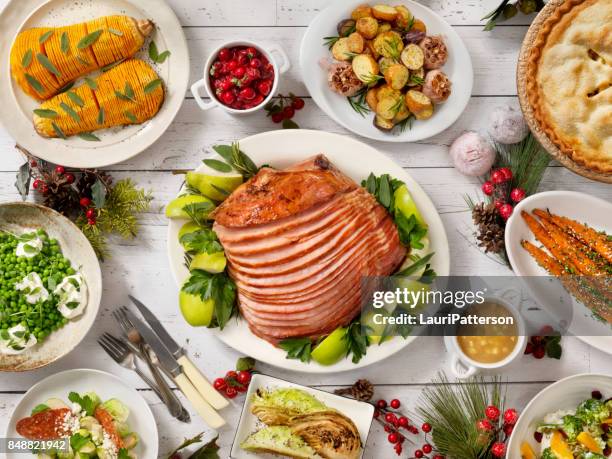 holiday spiral ham dinner - spiral ham stock pictures, royalty-free photos & images
