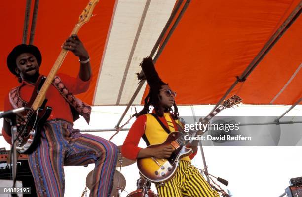 English roots reggae band Steel Pulse performing at the New Orleans Jazz & Heritage Festival, New Orleans, Louisiana, 6th June 1984. Rhythm guitarist...