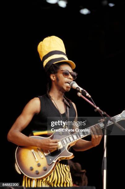 Rhythm guitarist and lead singer David Hinds performing with English roots reggae band Steel Pulse, 1983.