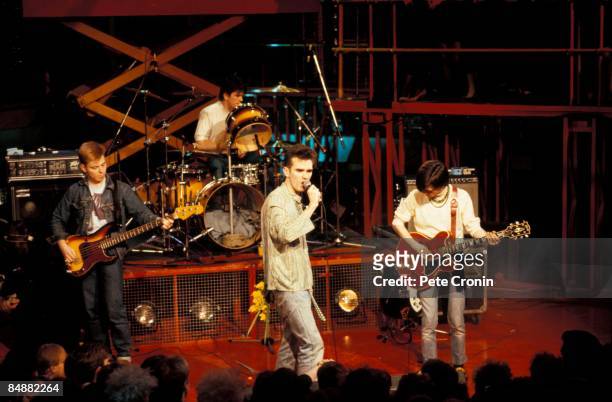 Photo of Mike JOYCE and SMITHS and MORRISSEY and Andy ROURKE and Johnny MARR; L-R: Andy Rourke, Mike Joyce , Morrissey, Johnny Marr , performing live...