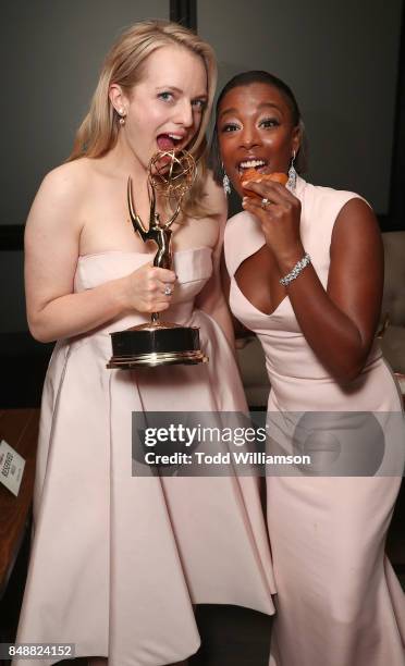 Elisabeth Moss and Samira Wiley attend Hulu's 2017 Emmy After Party at Otium on September 17, 2017 in Los Angeles, California.