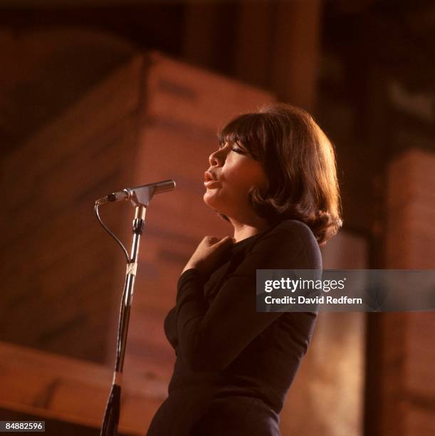 French singer and actress Juliette Greco performs on a television show in London circa 1965.
