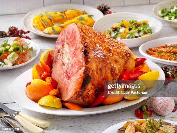 holiday ham dinner - spiral ham stock pictures, royalty-free photos & images