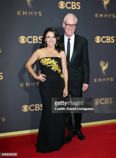 Actors Julia Louis-Dreyfus and Brad Hall attend the 69th Annual Primetime Emmy Awards - Arrivals at Microsoft Theater on September 17, 2017 in Los...