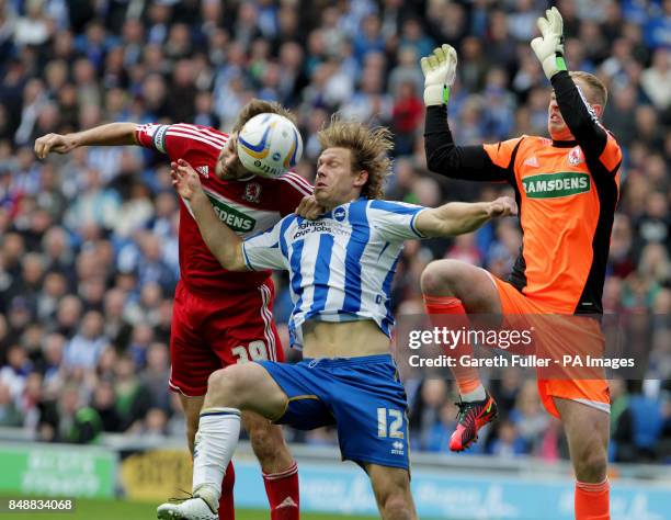 Brighton's Craig Mackail-Smith in action with Middlesbrough's Jonathan Woodgate and Jason Steele during the Npower Championship match at the AMEX...