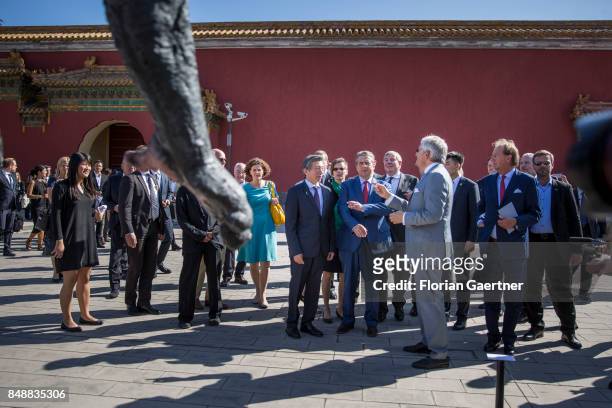 German Foreign Minister and Vice Chancellor Sigmar Gabriel visits an exhibition at the Taimiao Temple of the Forbidden City before the opening of...