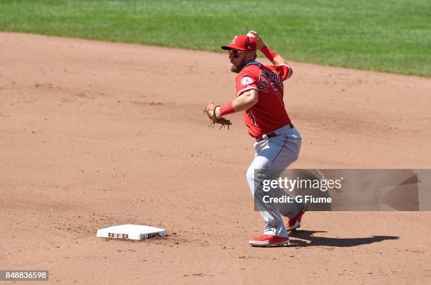 Cliff Pennington of the Los Angeles Angels throws the ball to first base against the Baltimore Orioles at Oriole Park at Camden Yards on August 20,...