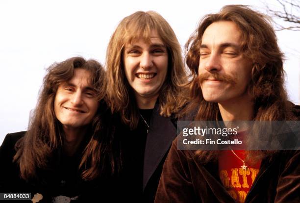 Photo of Alex LIFESON and RUSH and Geddy LEE and Neil PEART; L-R: Geddy Lee, Alex Lifeson, Neil Peart posed, group shot,