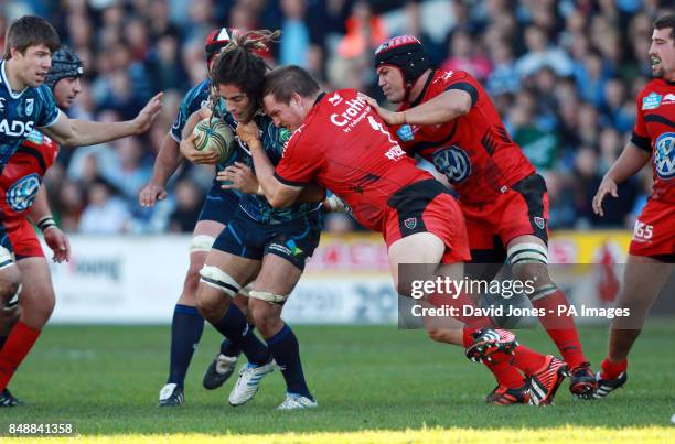 Cardiff Blues' Josh Navidi is tackled by Toulon's Gethin Jenkins during the Heineken Cup match at Cardiff Arms Park, Cardiff.