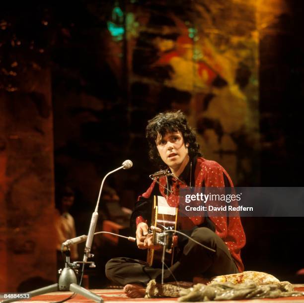 Scottish singer and musician Donovan plays an acoustic guitar on a BBC television show in London in August 1972.