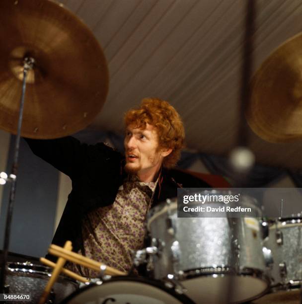 Photo of CREAM and Ginger BAKER, with Cream, performing live onstage, Cream's first live appearance, playing drums