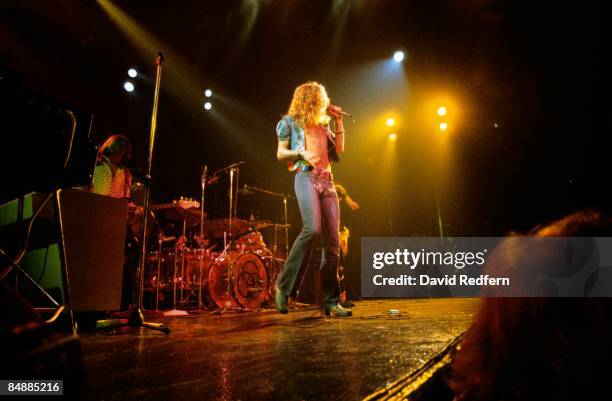 From left, bassist John Paul Jones, drummer John Bonham, singer Robert Plant and guitarist Jimmy Page perform live on stage during a concert by...