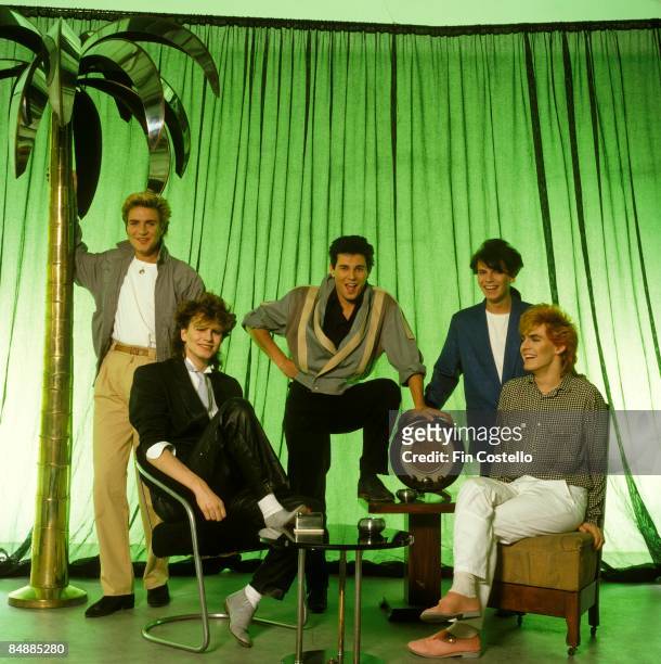 Photo of DURAN DURAN; L-R: Simon Le Bon , John Taylor, Roger Taylor, Andy Taylor, Nick Rhodes, posed, studio, group shot