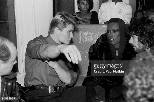 Actor Dolph Lundgren and singer and actress Grace Jones at the Limelight in Chicago, Illinois, November 25, 1985.