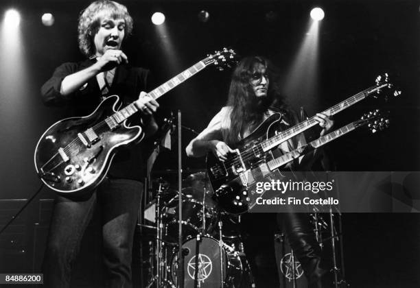 Photo of Geddy LEE and Alex LIFESON and RUSH; L-R: Alex Lifeson and Geddy Lee performing live onstage on Permanent Waves tour