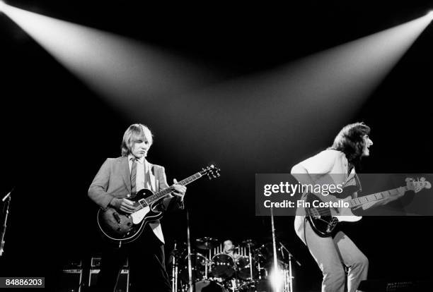 Photo of RUSH, L-R: Alex Lifeson, Neil Peart , Geddy Lee performing live onstage on Exit...Stage Left tour