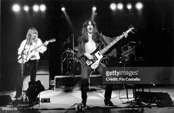 Photo of Geddy LEE and Alex LIFESON and RUSH, Alex Lifeson & Geddy Lee performing live onstage on A Farewell To Kings tour