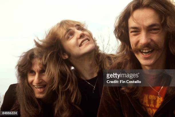 Photo of Alex LIFESON and RUSH and Geddy LEE and Neil PEART; Geddy Lee, Alex Lifeson, Neil Peart - posed, group shot,