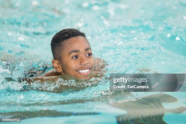 treading water - swimming goggles stock pictures, royalty-free photos & images