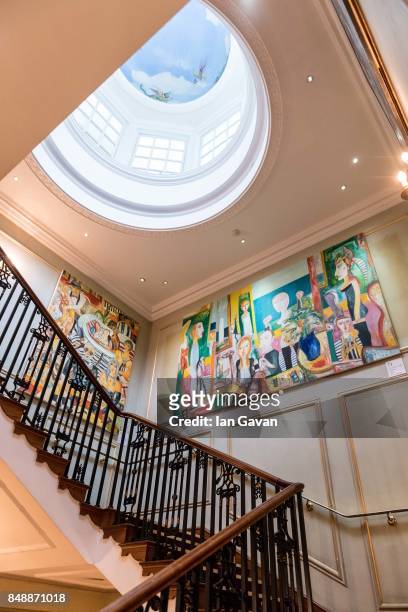 General view of the staircase with John Bellamy paintings at Fortum & Mason as Fortnums X Frank 17 sees 50 works by John Bellany go on display until...