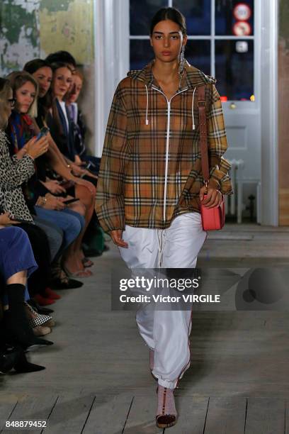 Model walks the runway at the Burberry Ready to Wear Fall/Winter 2017 fashion show during London Fashion Week September 2017 on September 16, 2017 in...