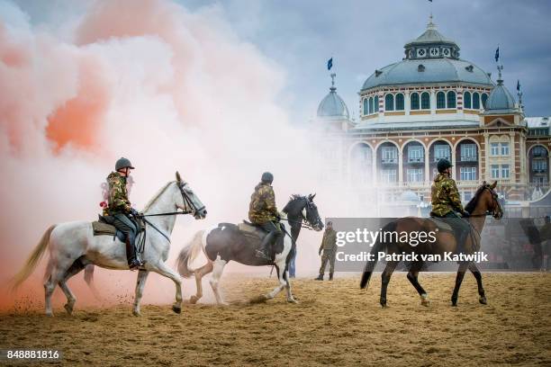 Horses of the Cavalry honorary escort are tested with noise, music and smoke during a training session the day before Prinsjesdag on September 18,...