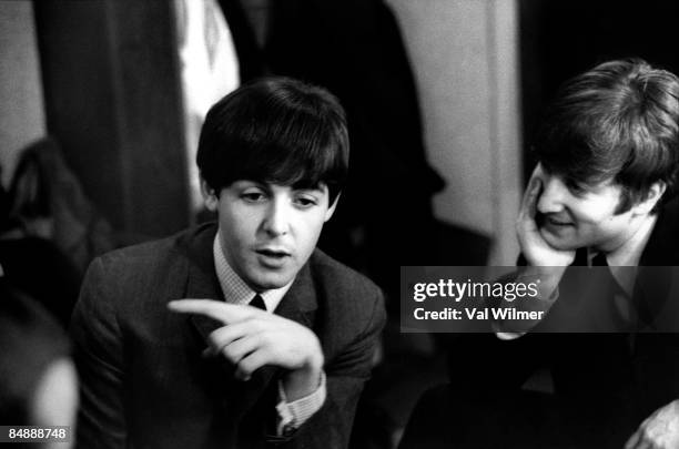 30th DECEMBER: Paul McCartney and John Lennon from The Beatles posed backstage at the Finsbury Park Astoria, London during the band's Christmas Show...