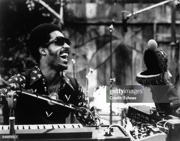 Photo of Stevie WONDER, Stevie Wonder appears on Sesame Street with S.S. Character Grover to perform Superstitious and a Sesame Street Jam. B&W !