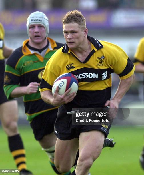 Josh Lewsey of Wasps moves through the Northampton Saints defence to score their second try during the Premiership match between Northampton and...