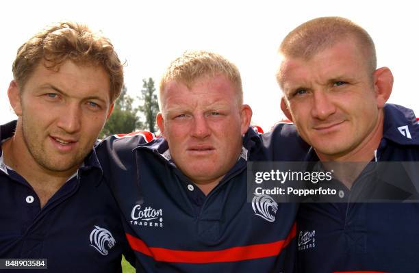 Leicester Tigers' front row, Franck Tournaire, Dorian West and Graham Rowntree, during a training session on August 28th, 2002.