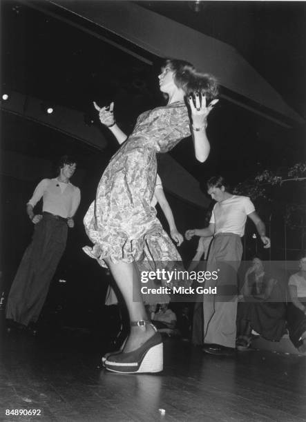 Dancers showing off the characteristic fashions and energetic dance moves of Northern Soul on the dance floor at an 'all-dayer', at The Palais,...