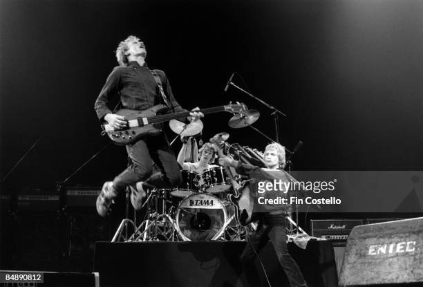 Photo of STING and Andy SUMMERS and POLICE and Stewart COPELAND, Sting , Stewart Copeland & Andy Summers performing together live on stage