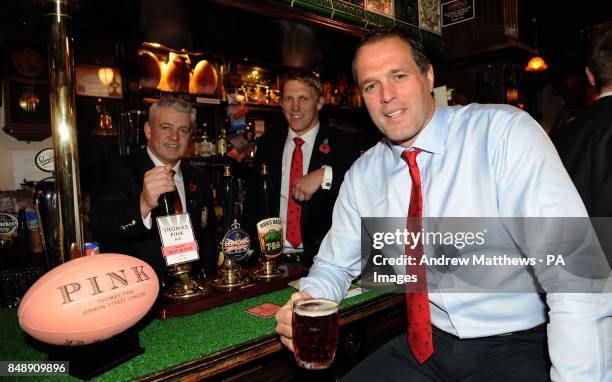 British and Irish lions head coach Warren Gatland poses with Lewis Moody and Martin Bayfield during the launch of the Thomas Pink collection at the...