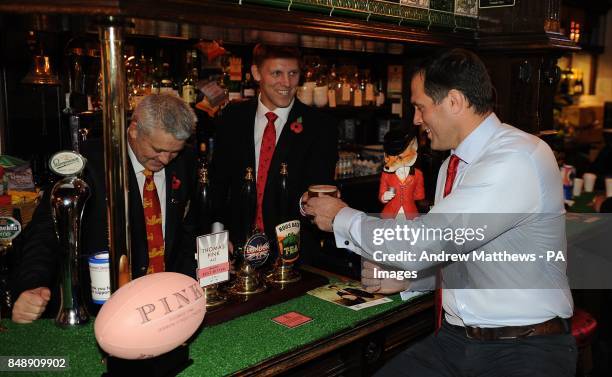 British and Irish lions head coach Warren Gatland poses with Lewis Moody and Martin Bayfield during the launch of the Thomas Pink collection at the...