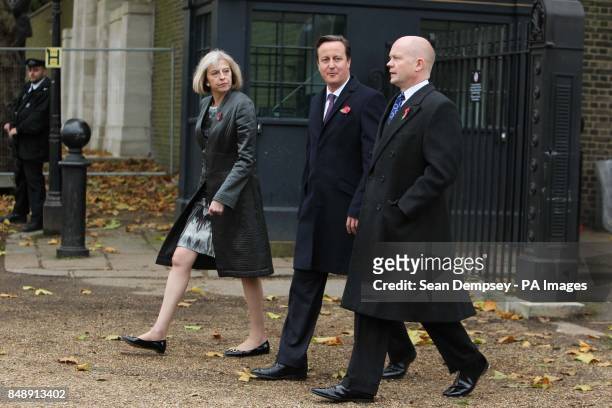 Home Secretary Theresa May, Prime Minister David Cameron and Foreign Secretary William Hague arrive at Horse Guards Parade in central London for the...