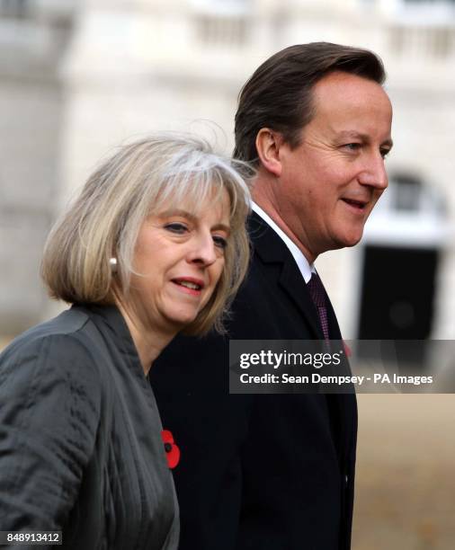 Home Secretary Theresa May and Prime Minister David Cameron arrive at Horse Guards Parade in central London for the Ceremonial Welcome to Indonesian...