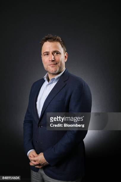 Stewart Butterfield, co-founder chief executive officer of Slack Technologies Inc., poses for a photograph following a Bloomberg Television interview...