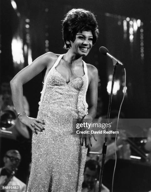 Welsh singer Shirley Bassey performs on a television show in London circa 1965. David Redfern Premium Collection.