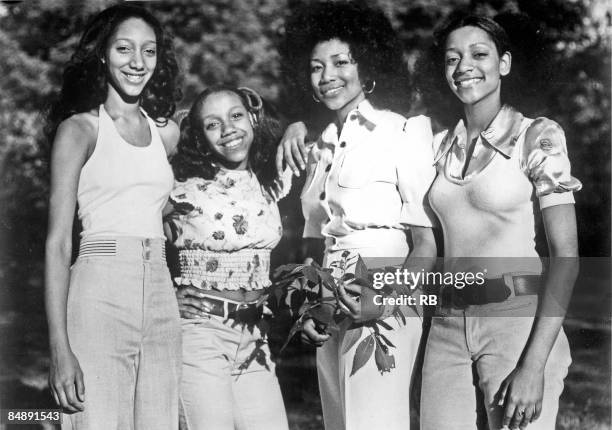 Debbie Sledge, Kathy Sledge, Joni Sledge and Kim Sledge of the vocal group "Sister Sledge" pose for a portrait, circa 1974.