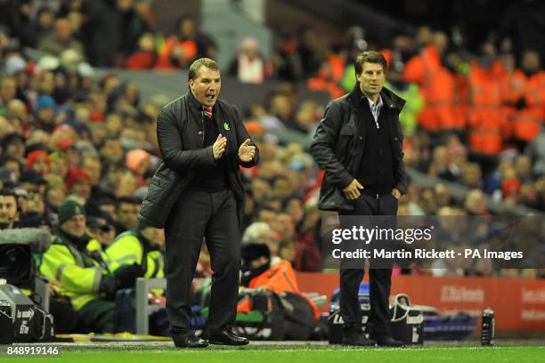 Swansea City manager Michael Laudrup and Liverpool manager Brendan Rodgers on the touchline