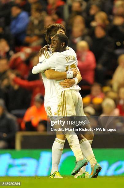 Swansea City's Nathan Dyer celebrates scoring his teams second goal of the game with teammate Sung-Yeung Ki