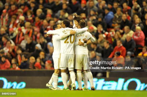 Swansea players celebrate their teams second goal of the game