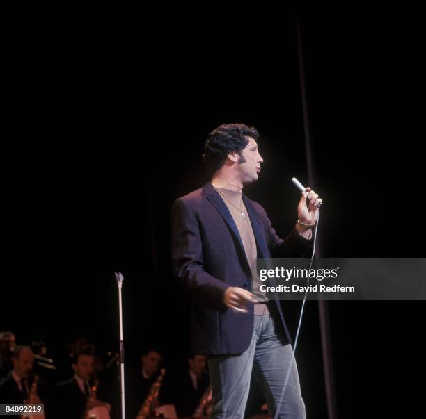 Welsh singer Tom Jones performs live on stage in London circa 1965.