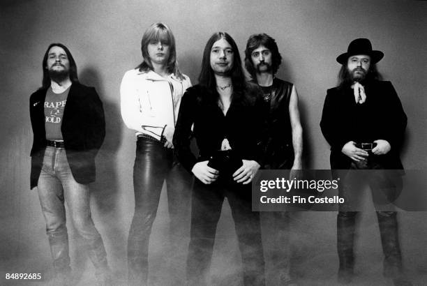 Photo of MAGNUM; Posed group portrait L-R Tony Clarkin, Mark Stanway, Bob Catley, Wally Lowe and Kex Gorin